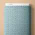 Blue fabric with star pattern and 'Cloud9' branding on a beige background