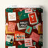 Fabric bolt with holiday-themed designs and text on a white background