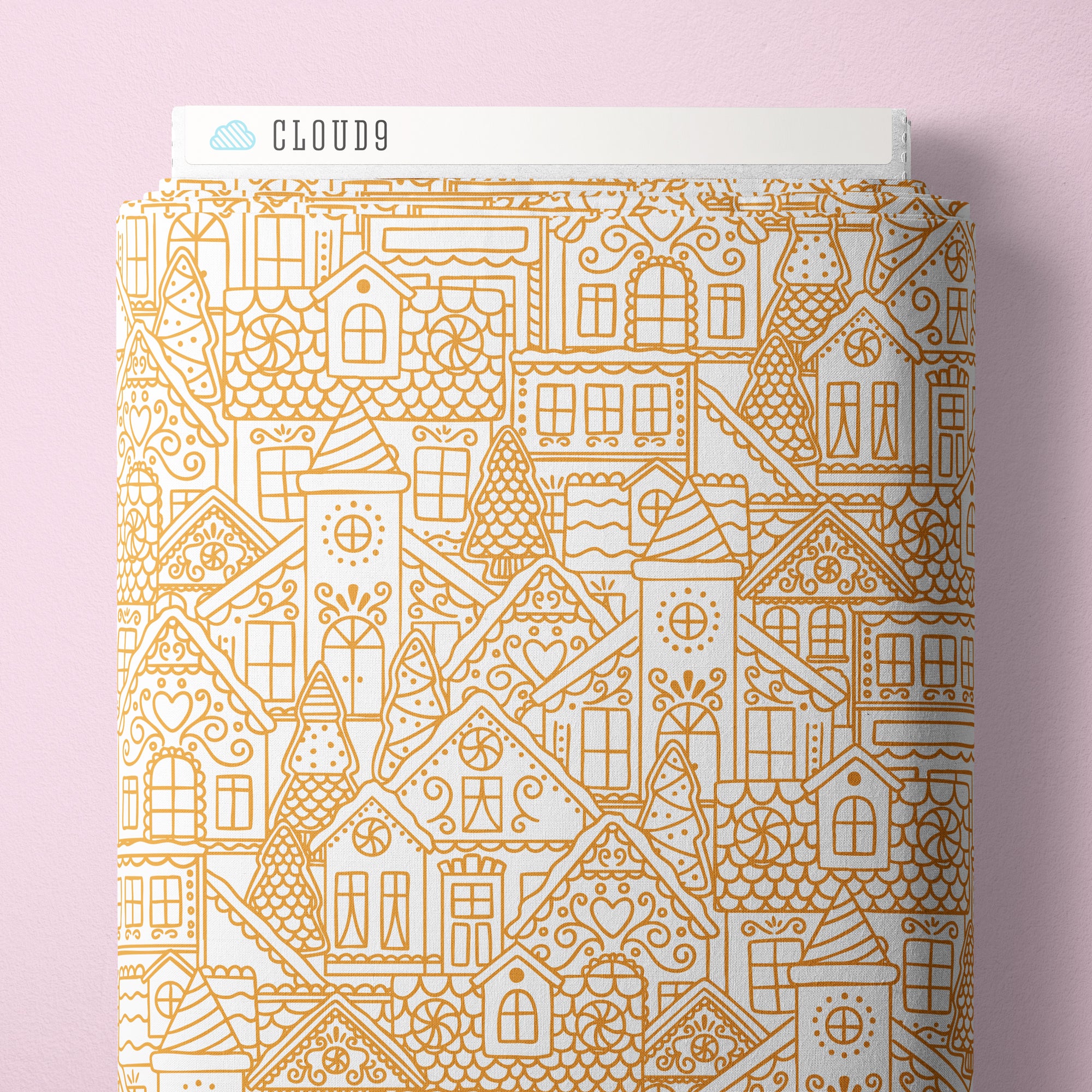 Fabric bolt with house pattern on a pink background