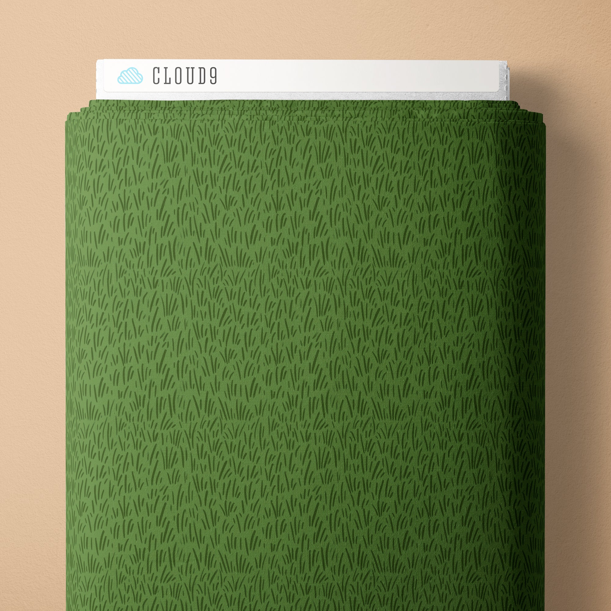 Green fabric with a subtle pattern on a beige background, featuring the brand 'Cloud9'.