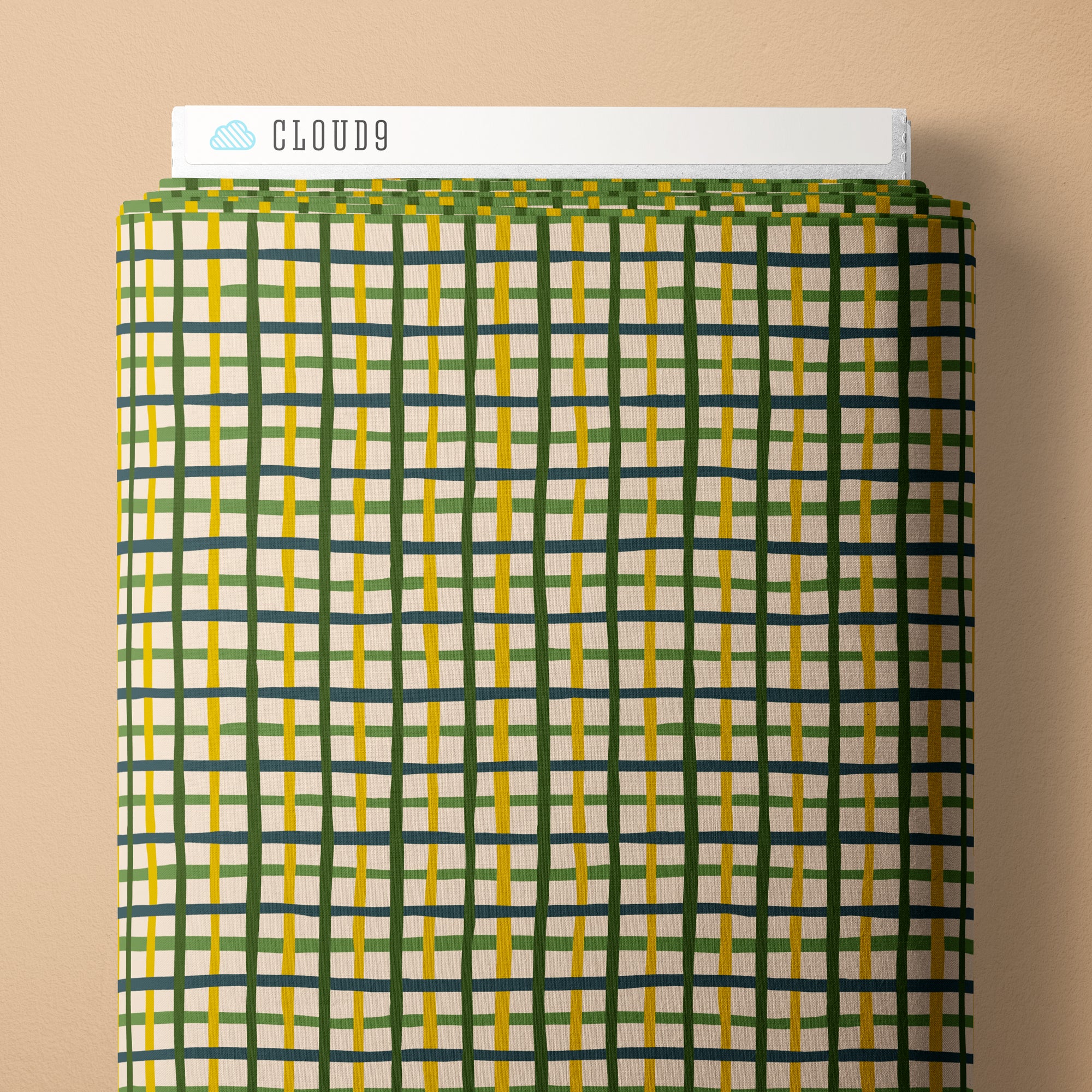 Plaid-patterned product with 'Cloud9' branding on a beige background
