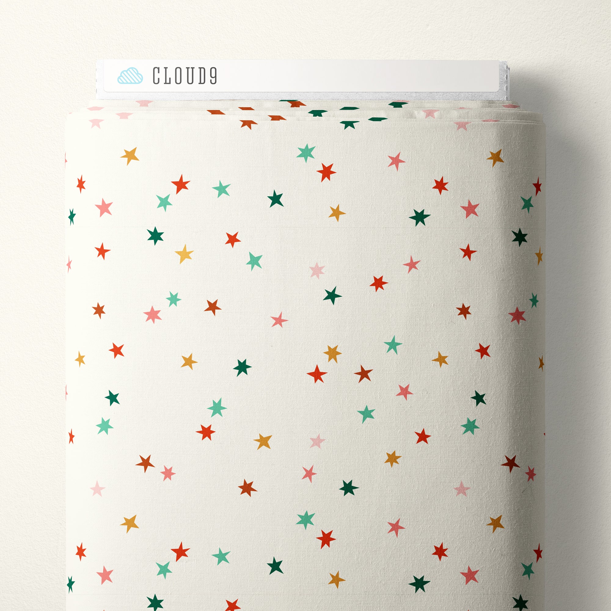 Fabric with star pattern on a white background, branded 'Cloud9'.