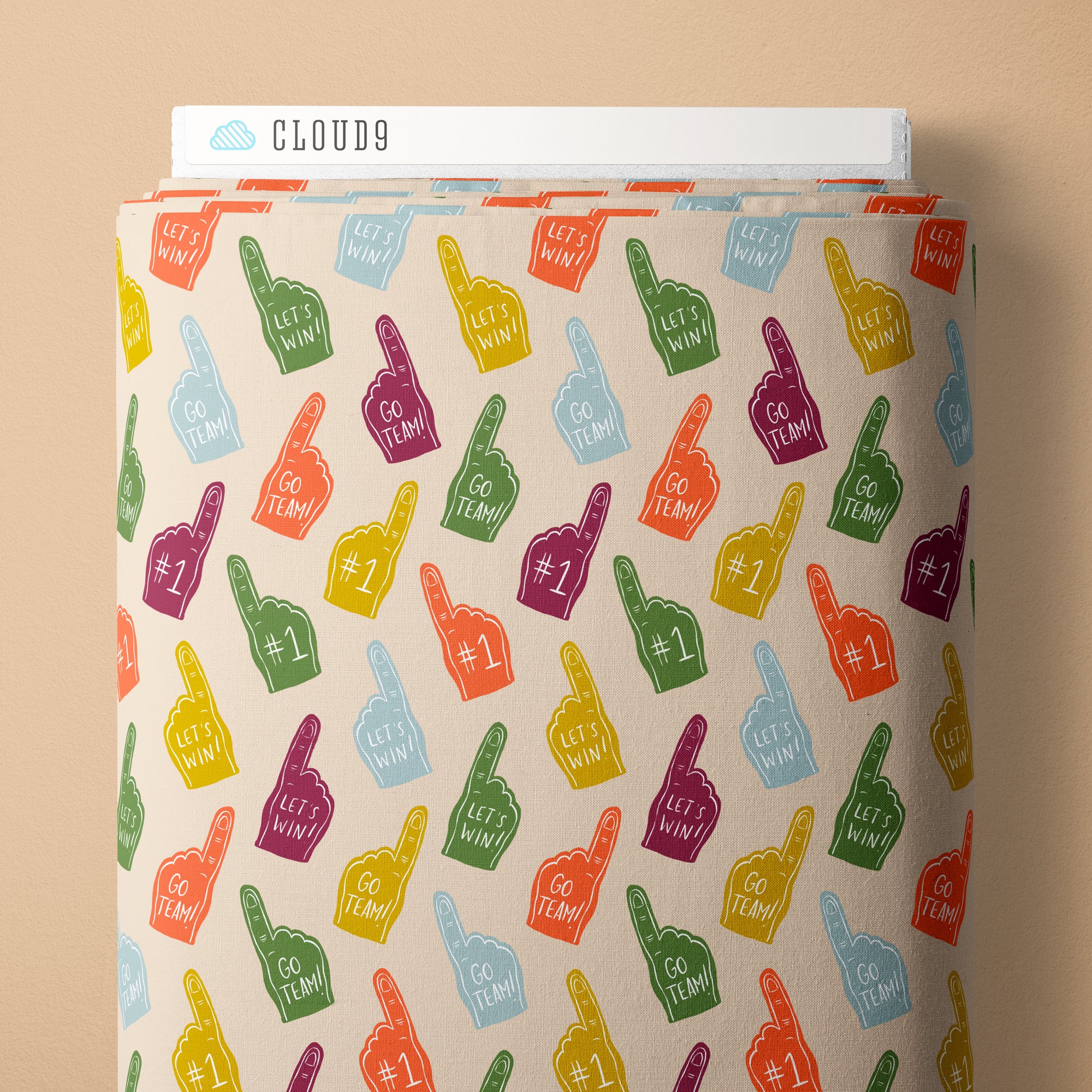Fabric roll with colorful foam finger patterns and text on a beige background