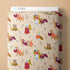Packaging of Cloud9 fabric with dog-themed pattern on a beige background