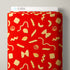 A roll of fabric featuring a vibrant red background with a playful pattern of flat-baked pasta shapes in a pale yellow/gold color. A white header card with the brand name 'CLOUD9' is visible at the top.
