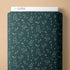 Dark green fabric with white football play patterns and 'Cloud9' branding on a beige background