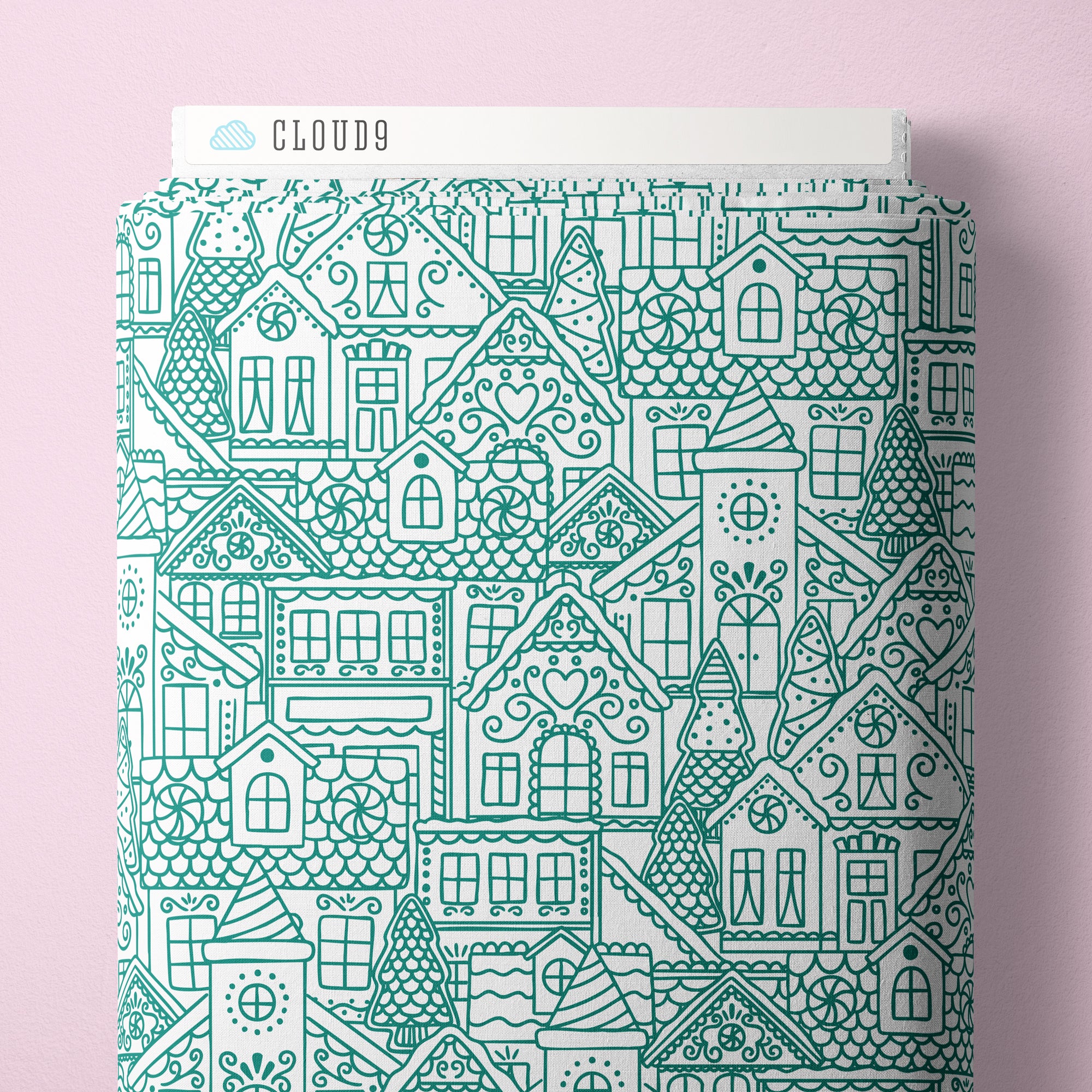 Fabric bolt with house pattern on a pink background