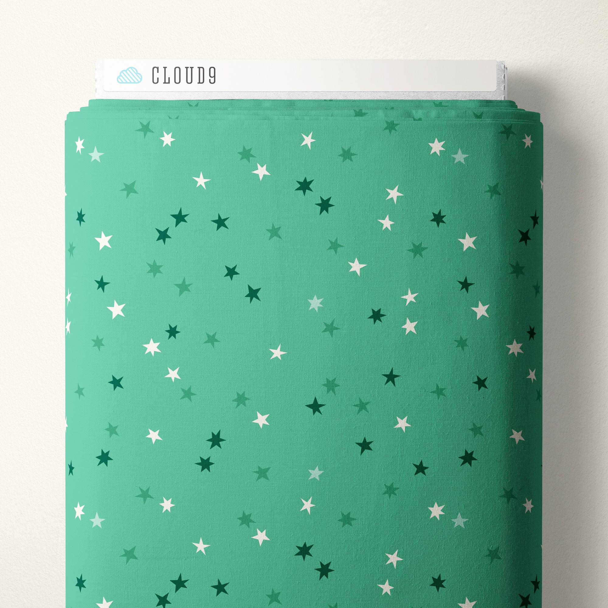 Green fabric with star pattern and 'Cloud9' branding on a white background