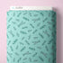 Teal-patterned fabric packaging with 'Cloud9' branding on a pink background