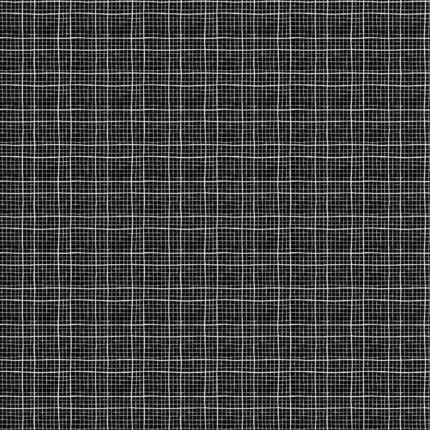A close-up of a black fabric with a white hand-drawn grid pattern.