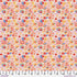 Colorful floral pattern on a pink background with a ruler at the bottom.