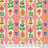 Colorful floral pattern on a pink background with a ruler at the bottom.