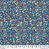 Colorful floral pattern on a blue background with a ruler at the bottom.