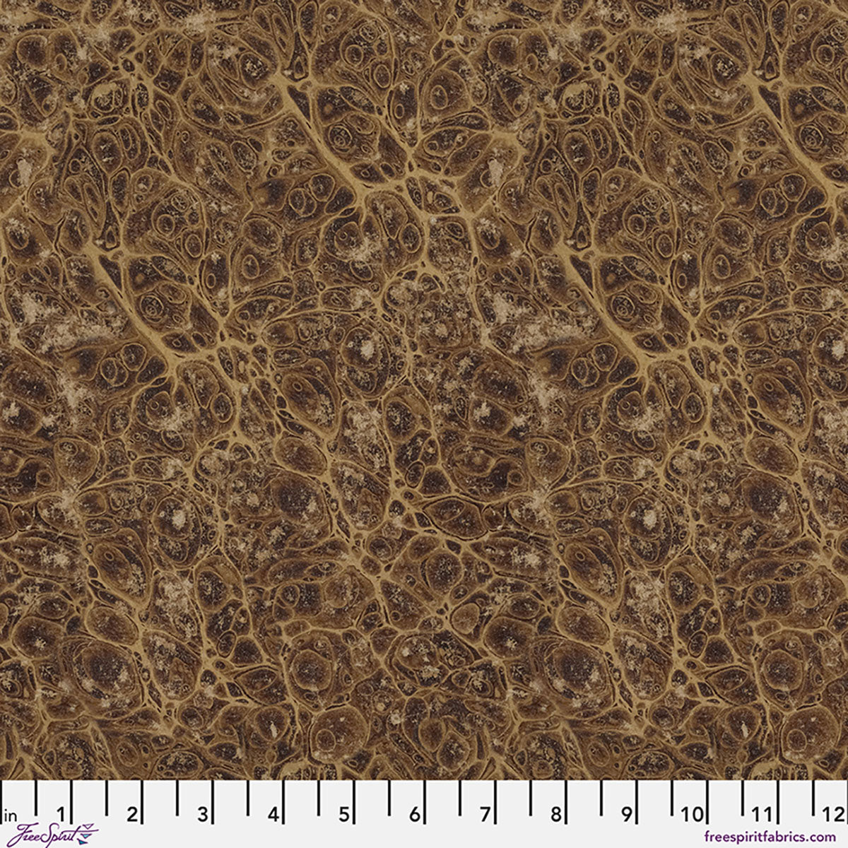 Brown and beige patterned fabric with a ruler at the bottom