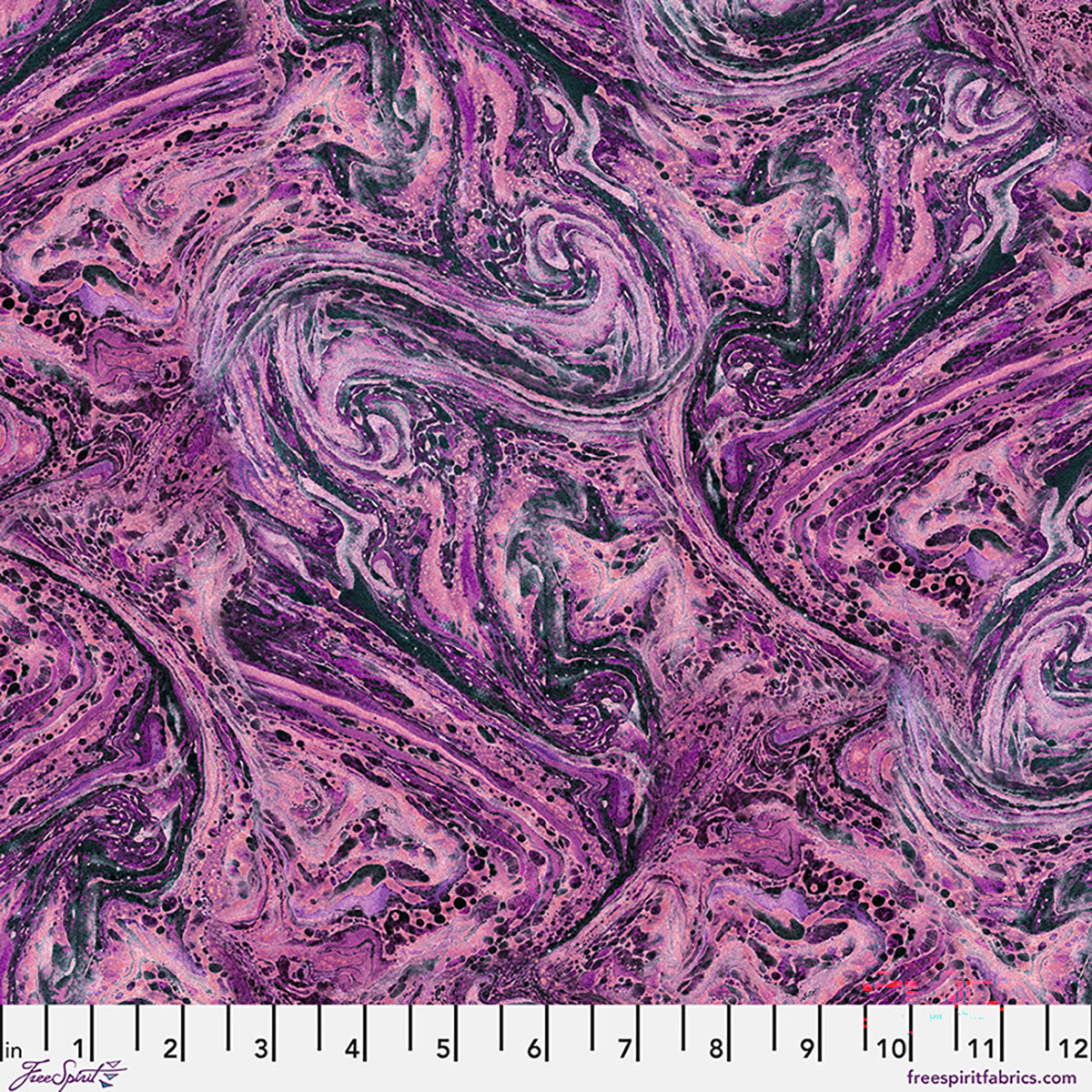 Marbled fabric pattern in purple and black with a ruler at the bottom
