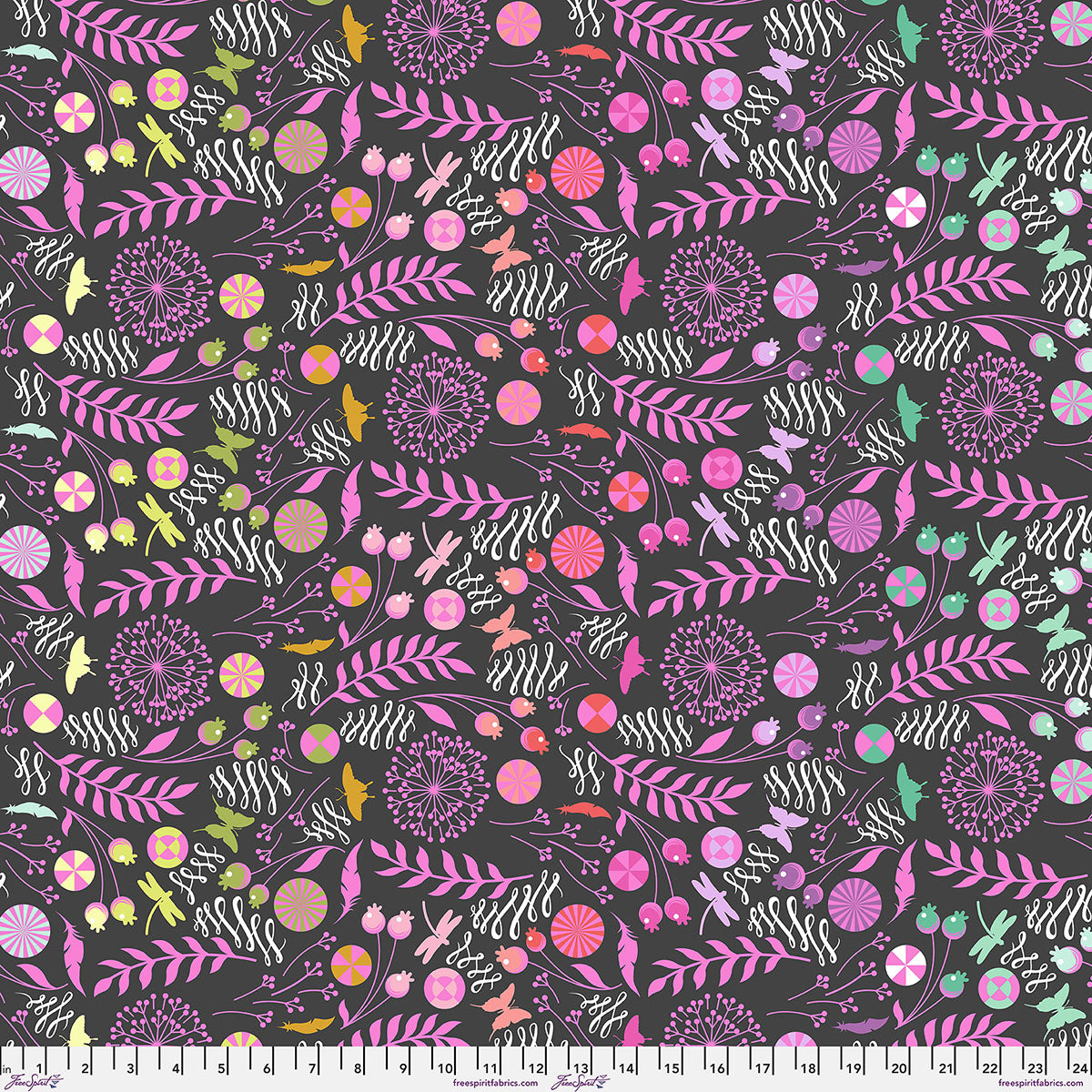A repeating floral and botanical pattern on a dark charcoal background, featuring pink, purple, orange, yellow, and mint green motifs including leaves, flowers, butterflies, and abstract shapes. A small ruler scale appears along the bottom edge.