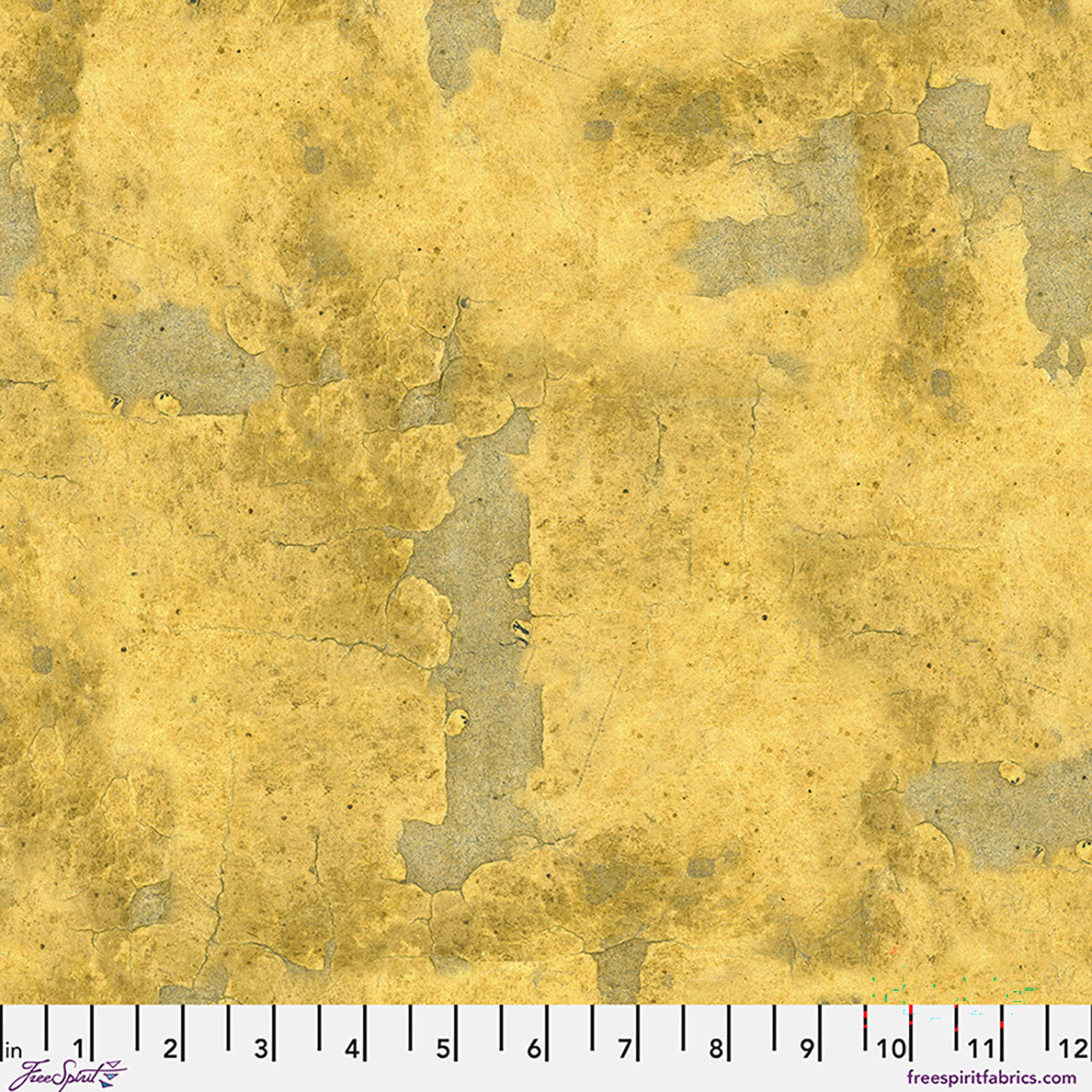 Textured gold fabric with a ruler at the bottom