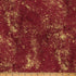 Textured red fabric with gold speckles and a ruler at the bottom for scale.