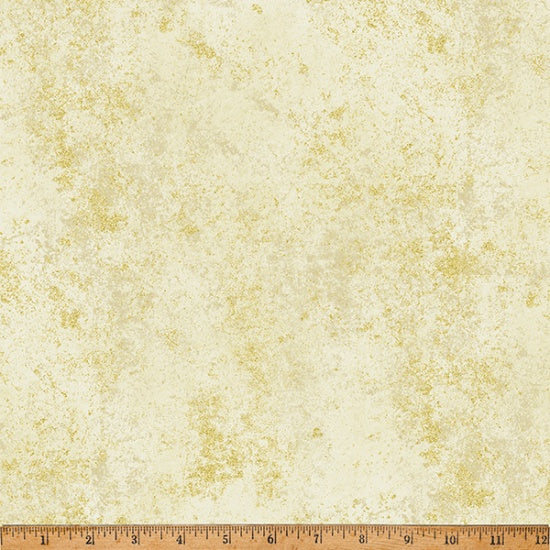 Textured fabric with gold speckles on a beige background, featuring a ruler at the bottom.