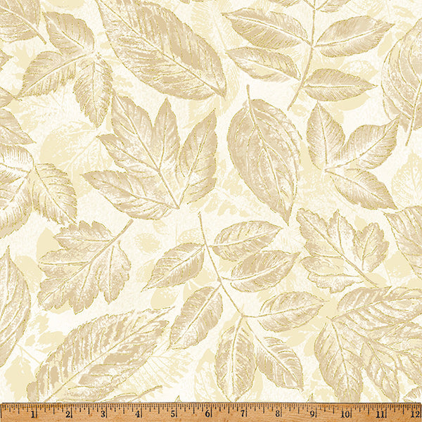 Fabric with leaf pattern on a beige background, ruler at the bottom for scale.