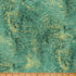 Textured green fabric with gold specks and a ruler at the bottom for scale.