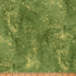 Textured green fabric with a ruler at the bottom for scale