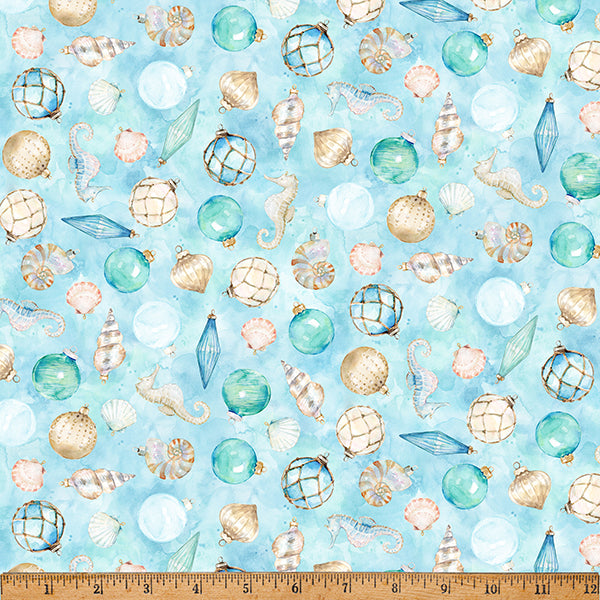 Seashell and ocean-themed fabric pattern with a ruler at the bottom for scale.