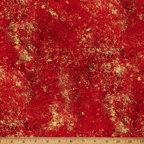 Red fabric with gold glitter texture and a ruler at the bottom for scale.