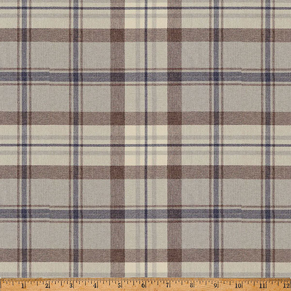 Plaid fabric with brown and blue pattern on a beige background, measured by a ruler at the bottom.