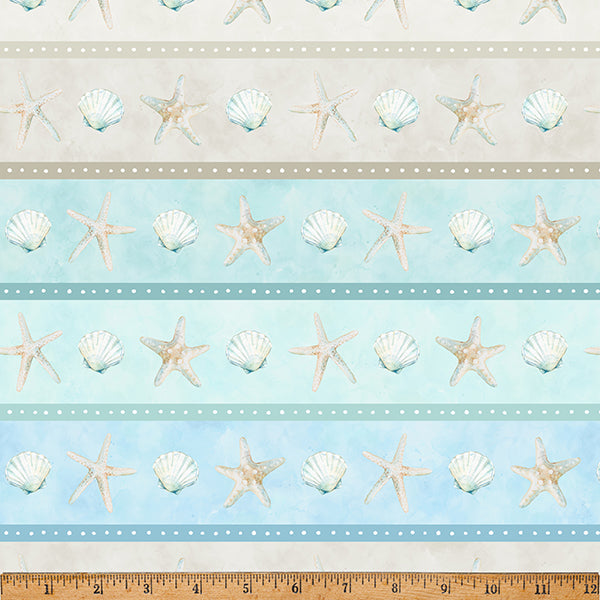 Seashell and starfish pattern on a light blue background with a ruler at the bottom.