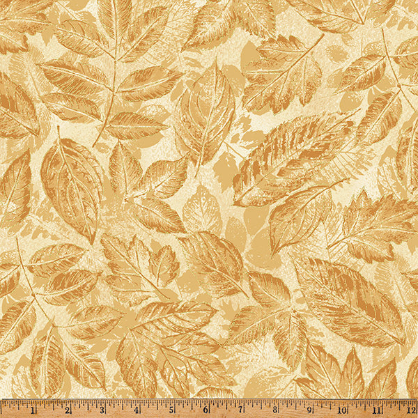 Fabric with leaf pattern on a beige background, ruler at the bottom for scale.
