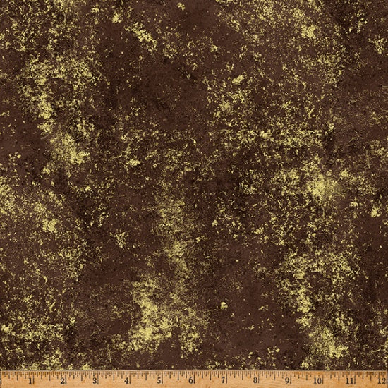 Textured brown fabric with a ruler at the bottom for scale