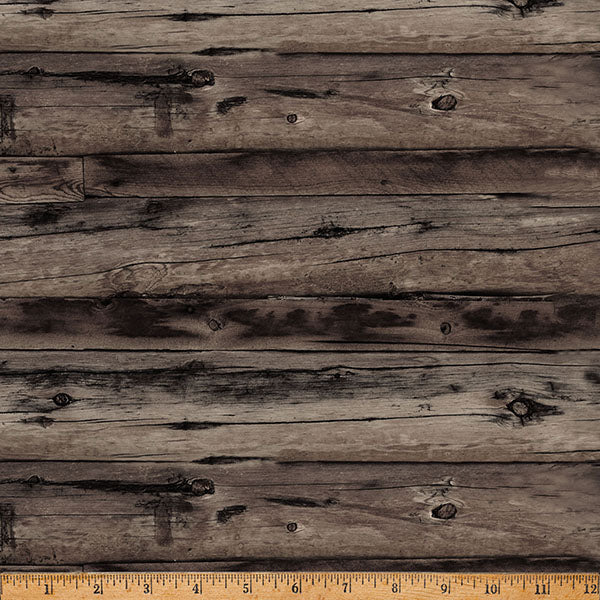 Textured wooden surface with a ruler at the bottom for scale.