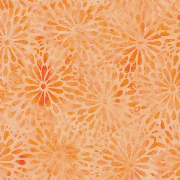 Patterned fabric with orange floral design on a peach background