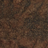 A close-up of a textured fabric featuring a dense field of small, scattered gold and beige dots over a mottled dark brown and black background.
