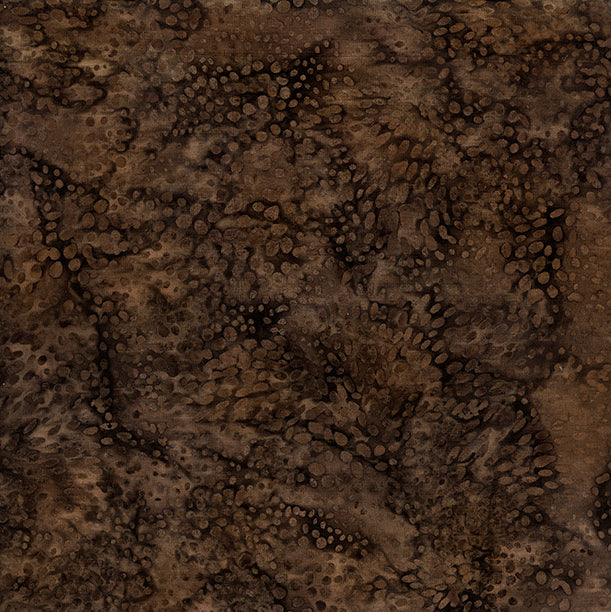 A close-up of a dark brown textured fabric with an organic, mottled pattern of lighter and darker brown areas.