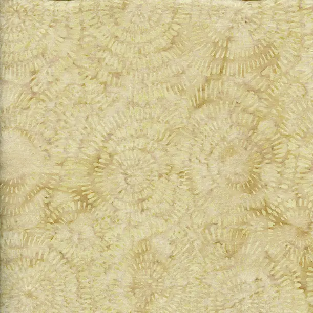 A close-up of a textured fabric or wallpaper pattern featuring a repeating beige and cream coral or ionic ring motif.