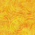 Patterned fabric with yellow and orange spiral design