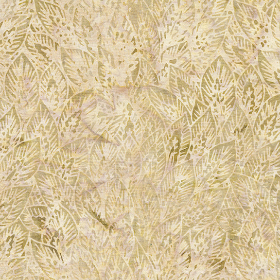 A close-up of a textured fabric or wallpaper pattern featuring a repeating leaf design in warm beige and light gold tones.