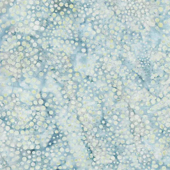 A close-up of a light blue and white abstract pattern with scattered circular dot motifs and soft marbled texture.