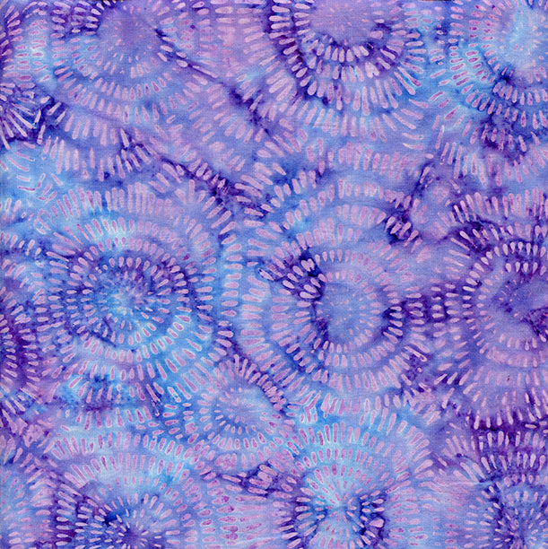 Patterned fabric with blue and purple circular design