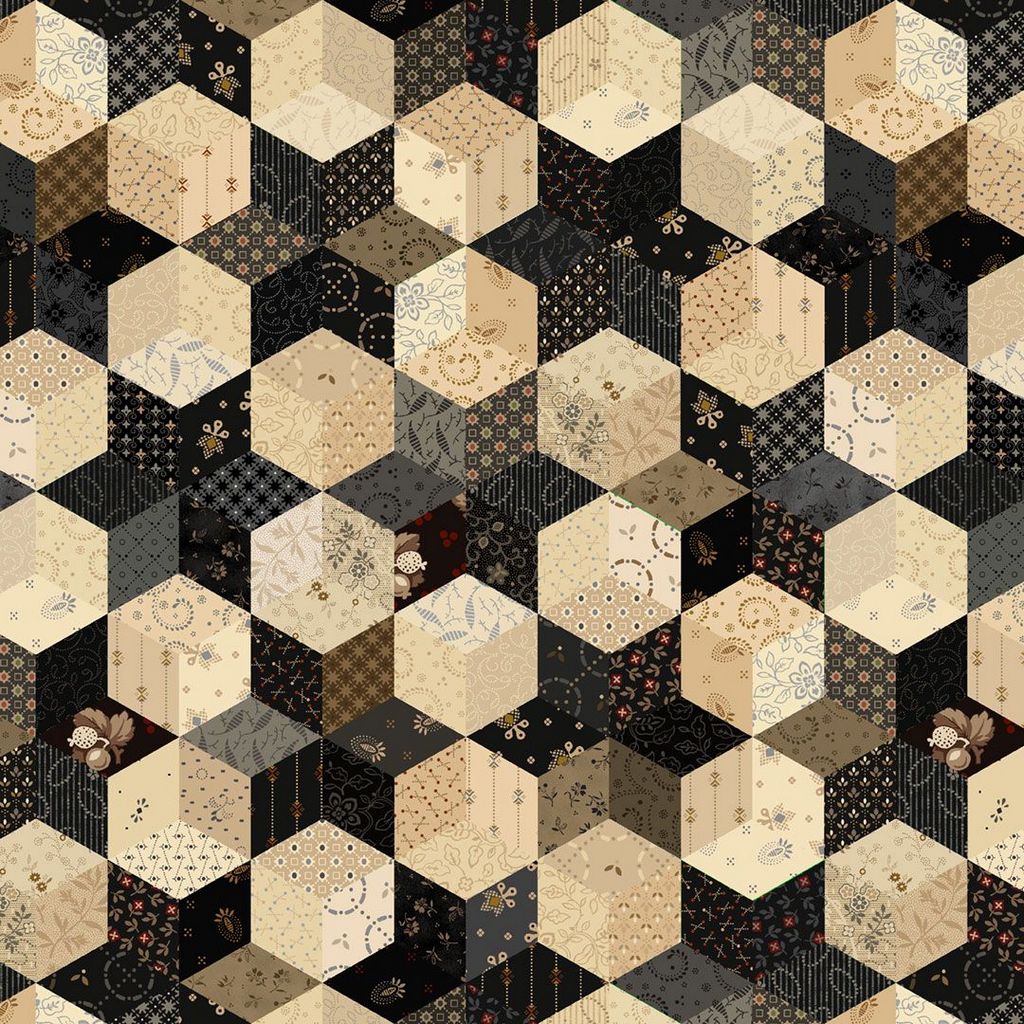 A repeating geometric quilt pattern made of hexagonal blocks in beige, cream, black, and brown, with floral and striped fabric designs.