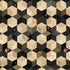A repeating geometric quilt pattern made of hexagonal blocks in beige, cream, black, and brown, with floral and striped fabric designs.