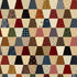 Patchwork pattern with triangular fabric pieces in various colors and patterns.