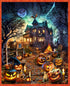 Halloween-themed scene with pumpkins, candles, and a haunted house under a full moon.
