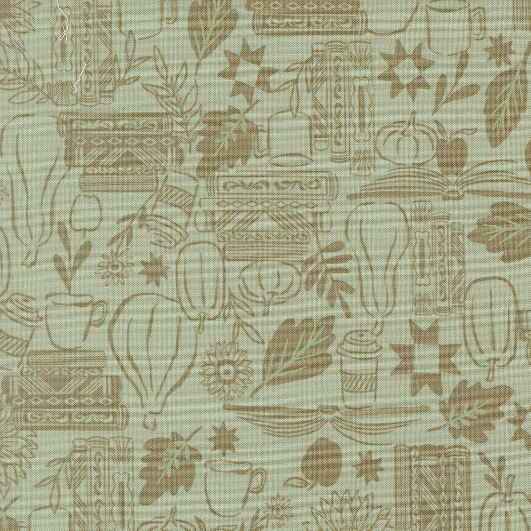 Patterned fabric with books, leaves, and other items on a green background