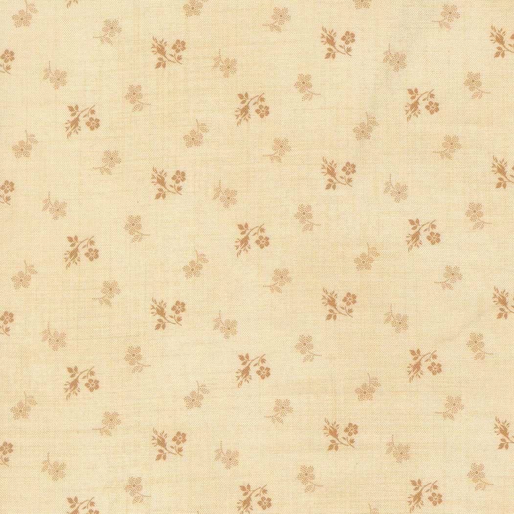 Beige fabric texture with small floral patterns