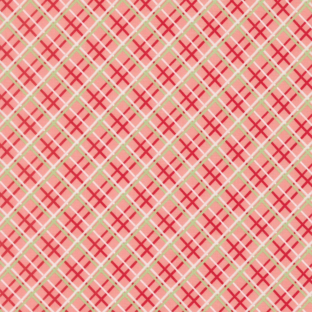 Red and green geometric pattern on a pink background