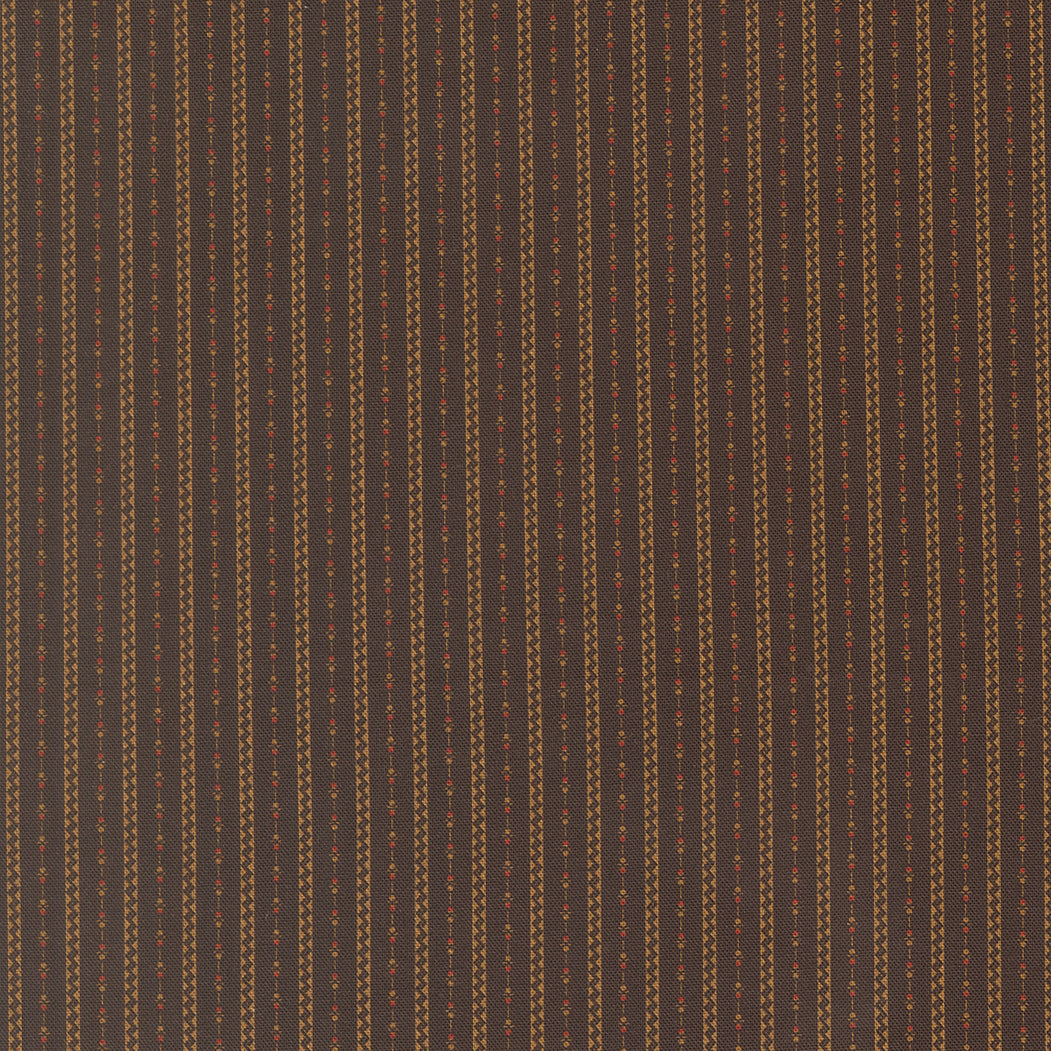 A close-up of a dark brown fabric featuring vertical stripes with small geometric and dotted details in tan, beige, and muted blue.