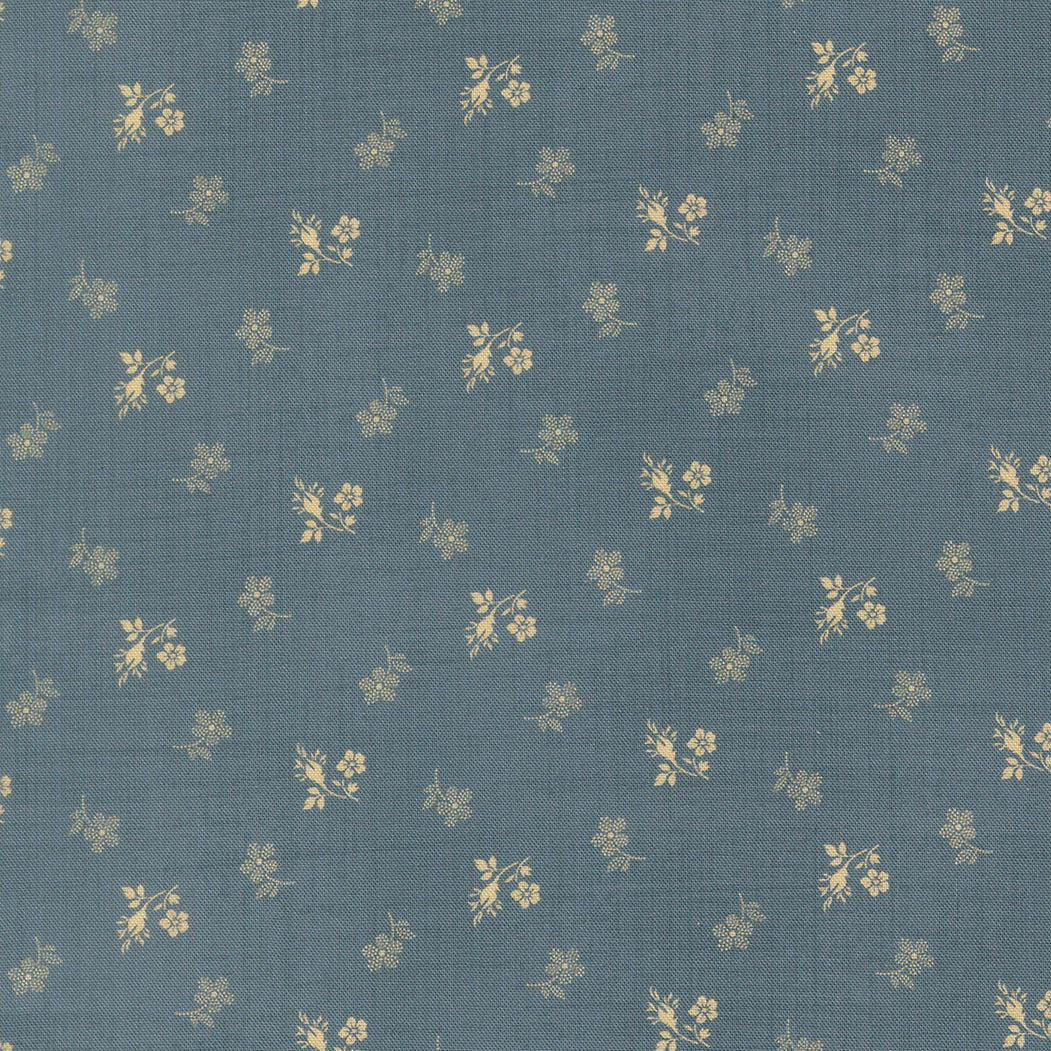 Floral pattern on a blue fabric background